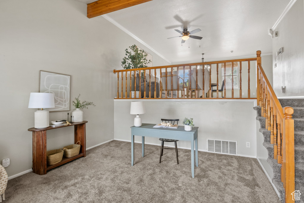 Carpeted office space with a ceiling fan, beamed ceiling, high vaulted ceiling, and baseboards