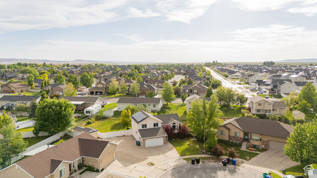 Aerial view of residential area with a mountain backdrop