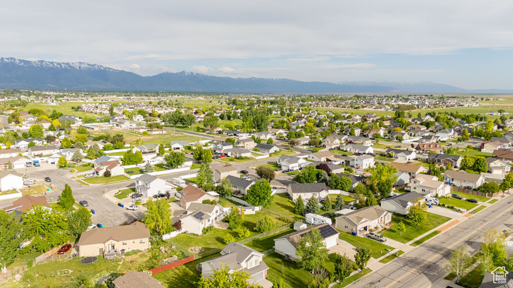 Aerial view of residential area with a mountain backdrop