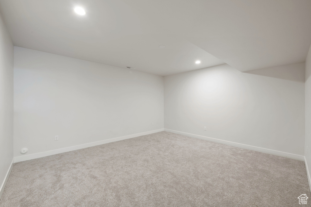 Bonus room featuring carpet flooring, recessed lighting, and baseboards