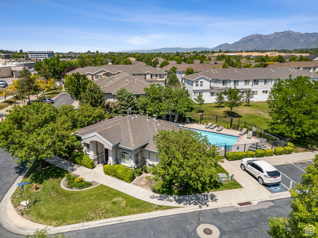 Aerial perspective of suburban area with a pool area