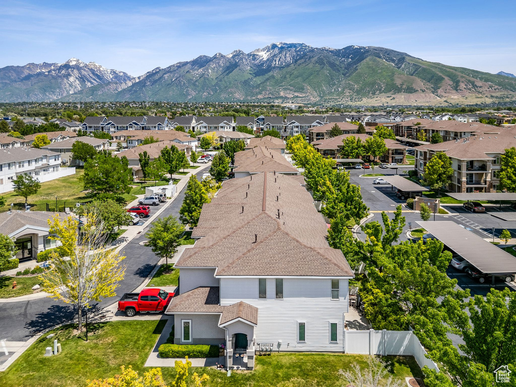 Aerial view of residential area with a mountain backdrop