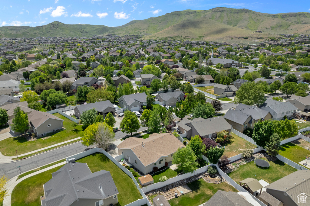 Aerial view of residential area with mountains