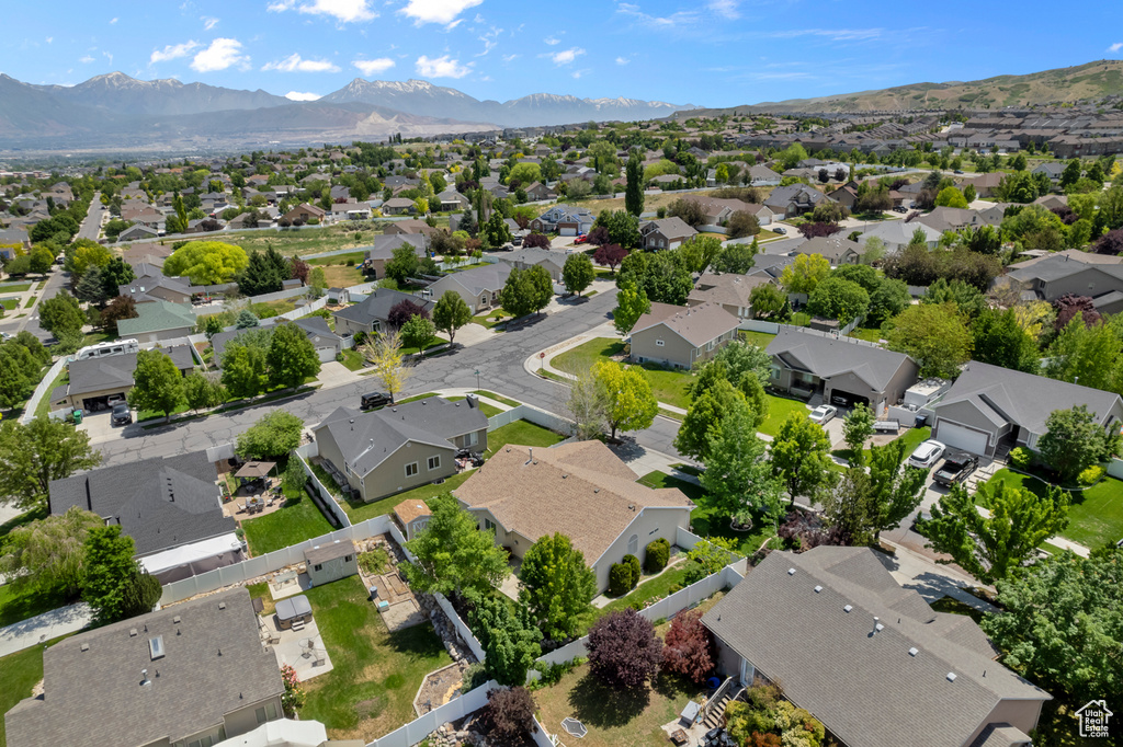 Aerial perspective of suburban area featuring mountains
