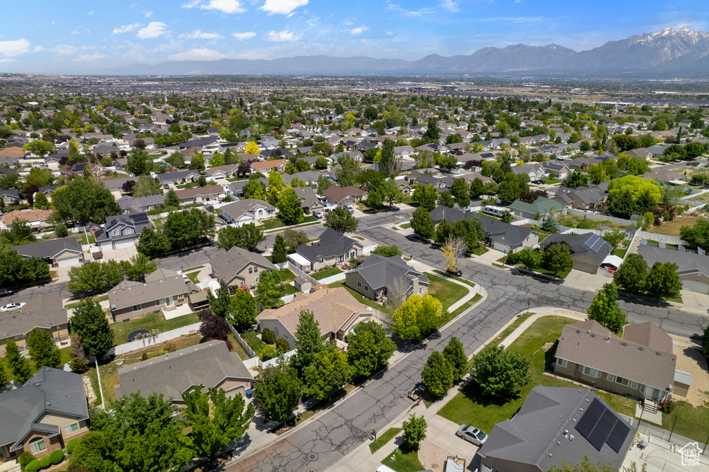 Aerial view of residential area with a mountain backdrop