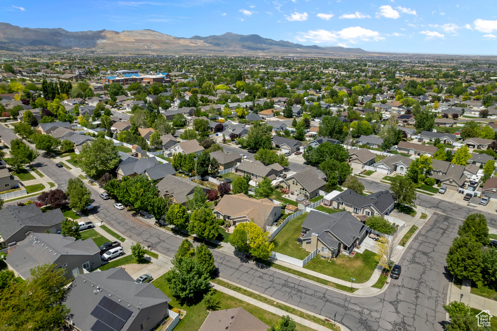 Aerial view of residential area with a mountain backdrop