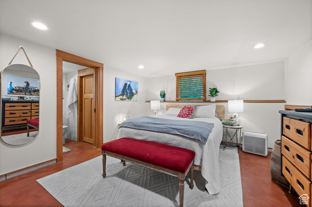 Bedroom with recessed lighting, baseboards, and connected bathroom