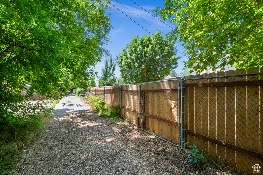 View of yard with a gate
