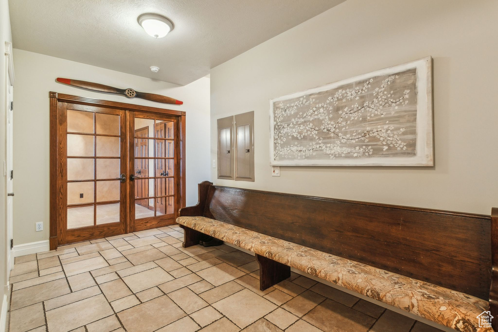 Foyer entrance featuring french doors