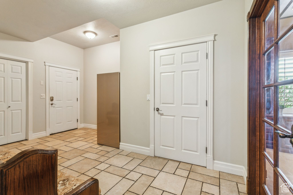 Entrance foyer with baseboards