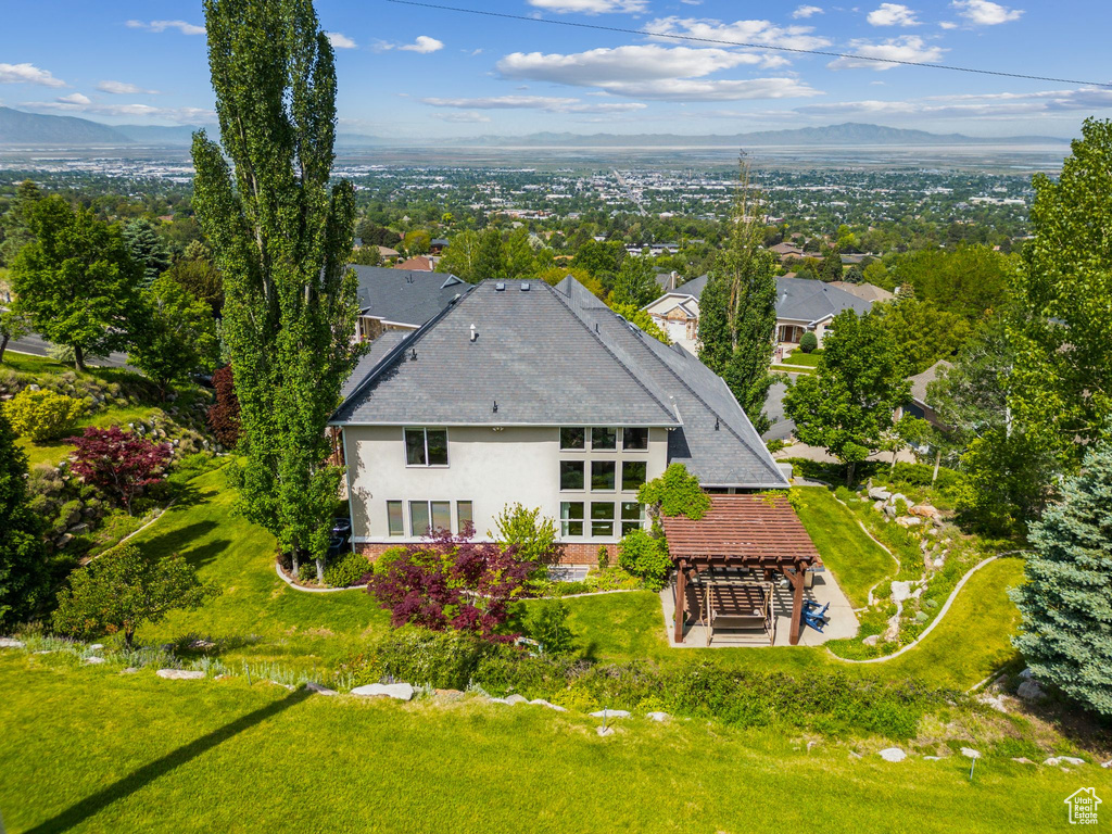 View of subject property featuring mountains