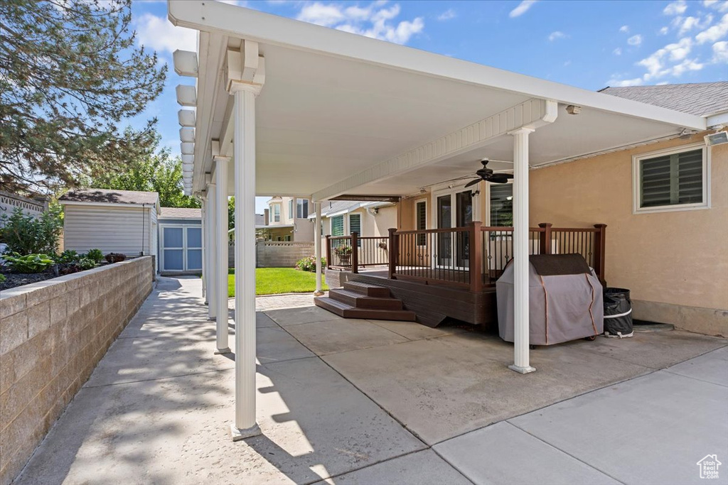 View of patio / terrace featuring ceiling fan and a wooden deck