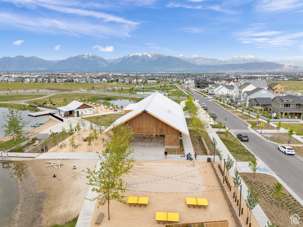 Aerial view of residential area featuring a water and mountain view