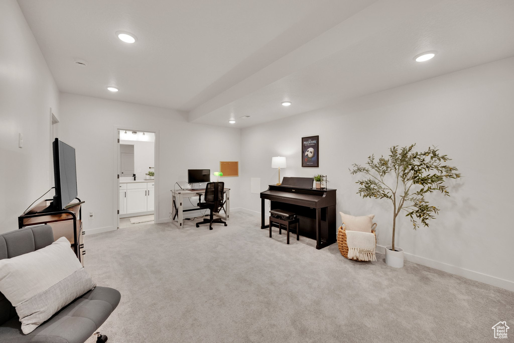 Office space featuring light colored carpet, recessed lighting, and baseboards
