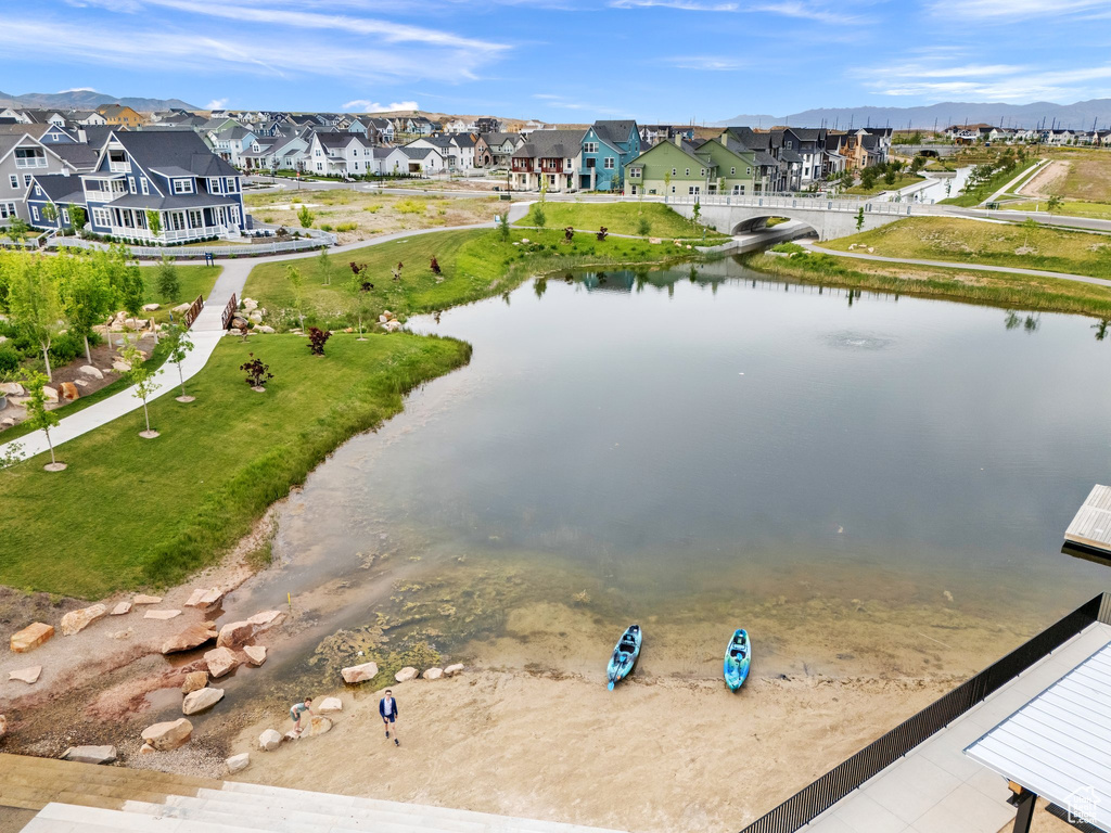 Aerial view of residential area with a nearby body of water