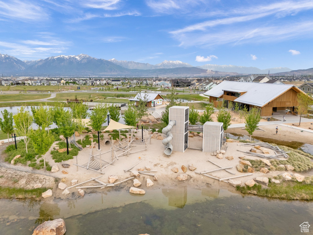 Mountain view with a large body of water and nearby suburban area