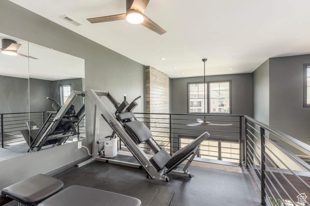 Workout area featuring ceiling fan