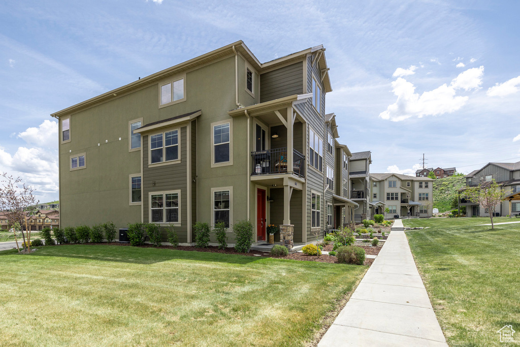 View of building exterior with a residential view