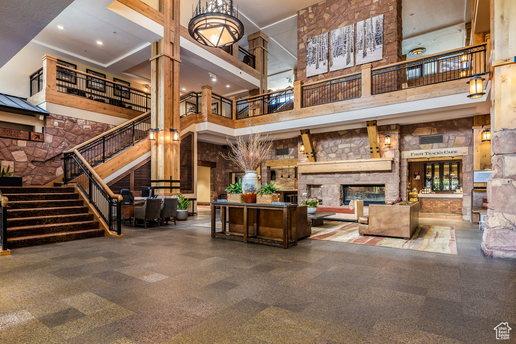 Community lobby with a high ceiling and stairway