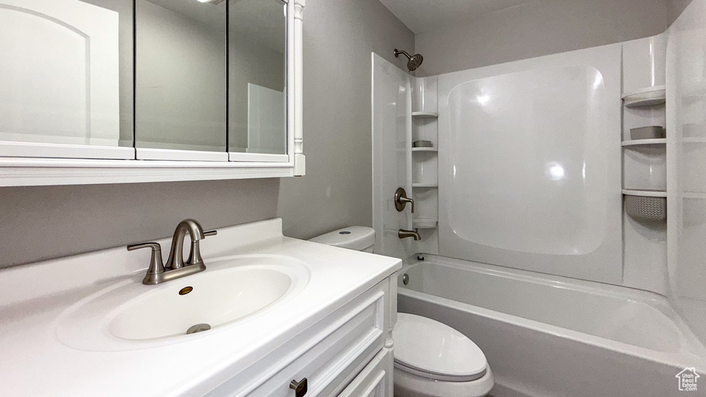 Full bath with toilet, tub / shower combination, and vanity