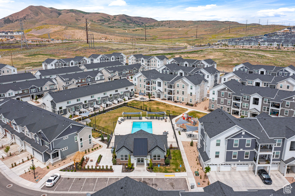 Bird's eye view of a mountainous background and a pool