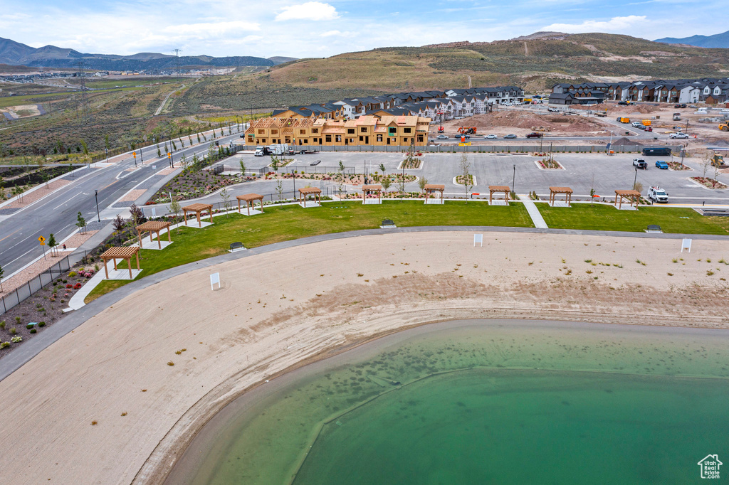 Aerial view of property's location with a mountainous background