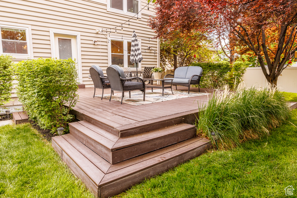 Wooden deck with outdoor lounge area