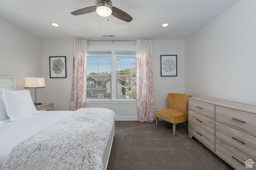 Bedroom with dark carpet, recessed lighting, baseboards, and ceiling fan