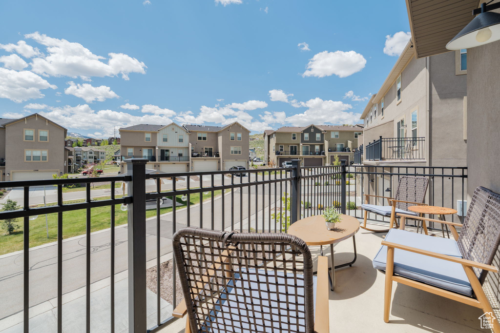 Balcony featuring a residential view