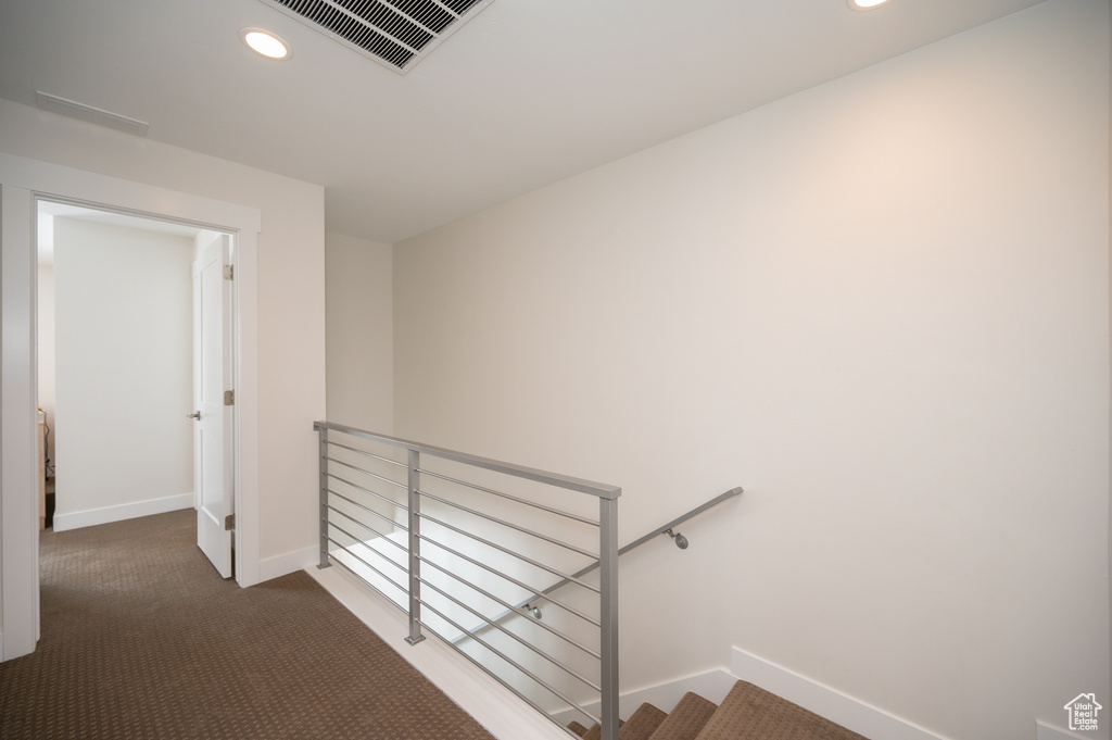 Stairs with baseboards, carpet floors, and recessed lighting