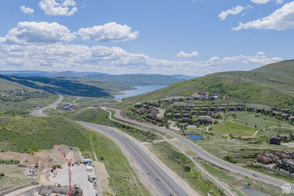 Bird's eye view of a water and mountain view and a main thoroughfare