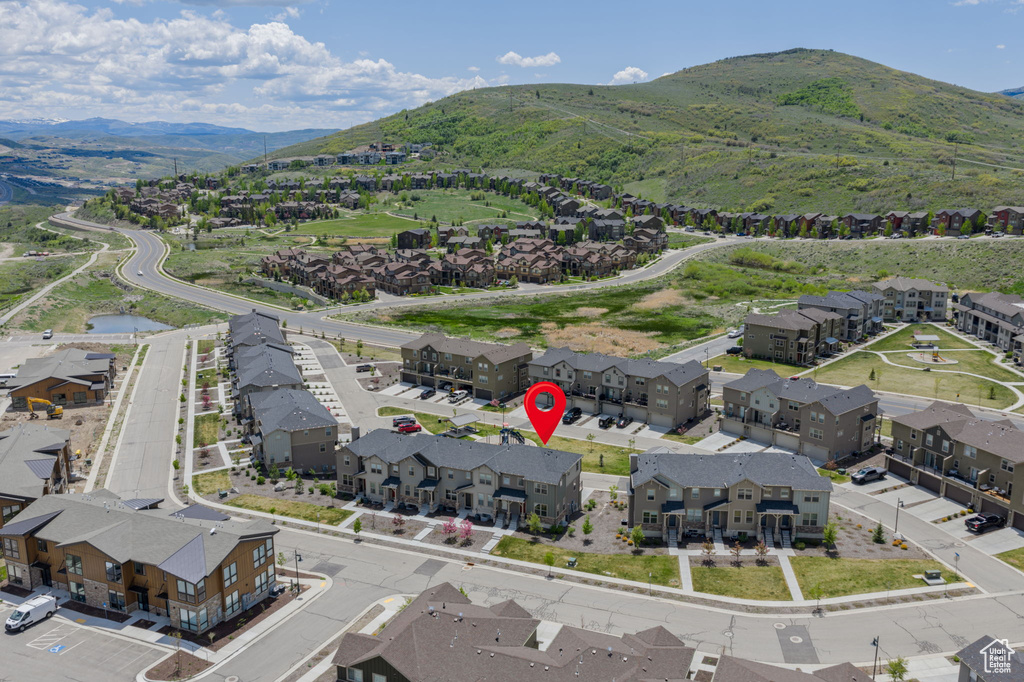 Aerial perspective of suburban area with mountains