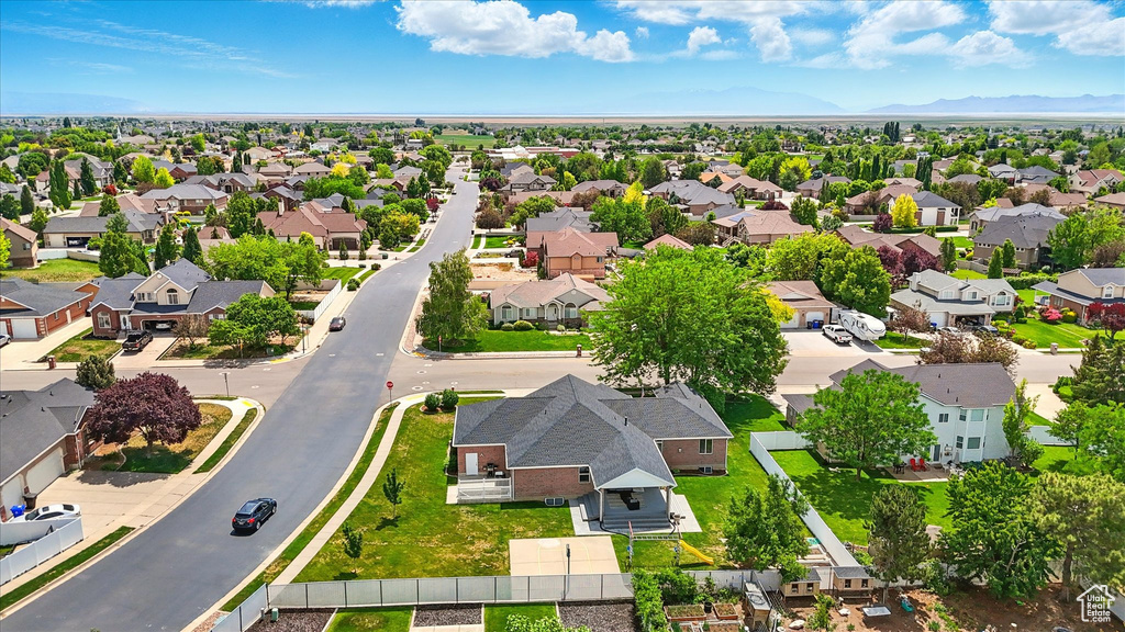 Aerial view of residential area with a mountainous background
