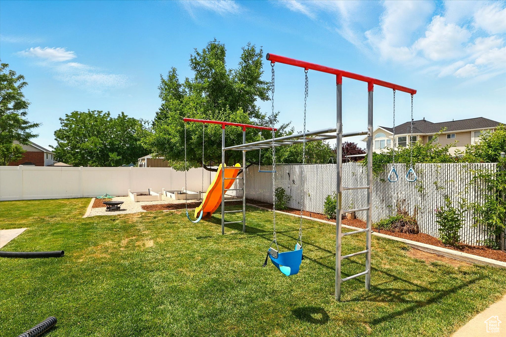 View of play area featuring a fire pit