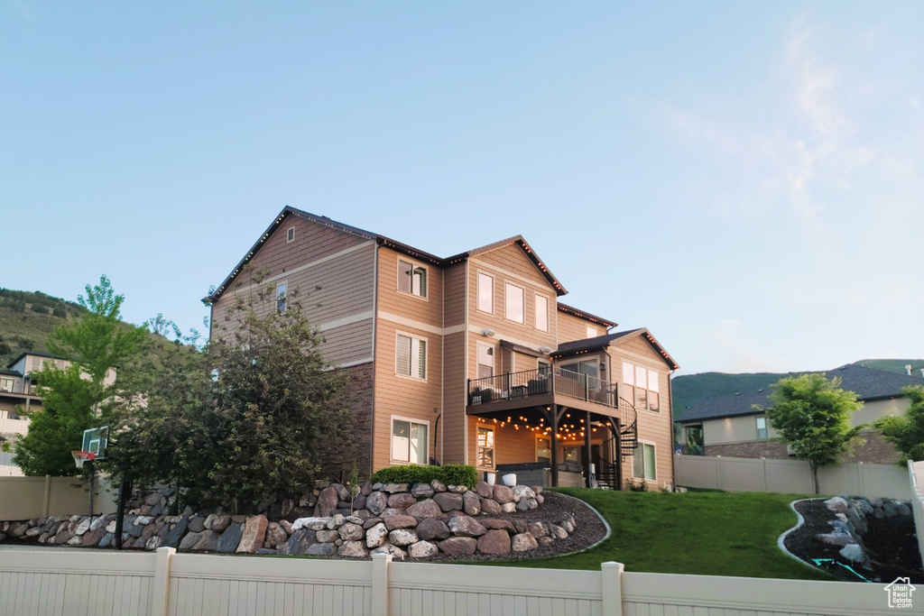 View of property with a fenced backyard