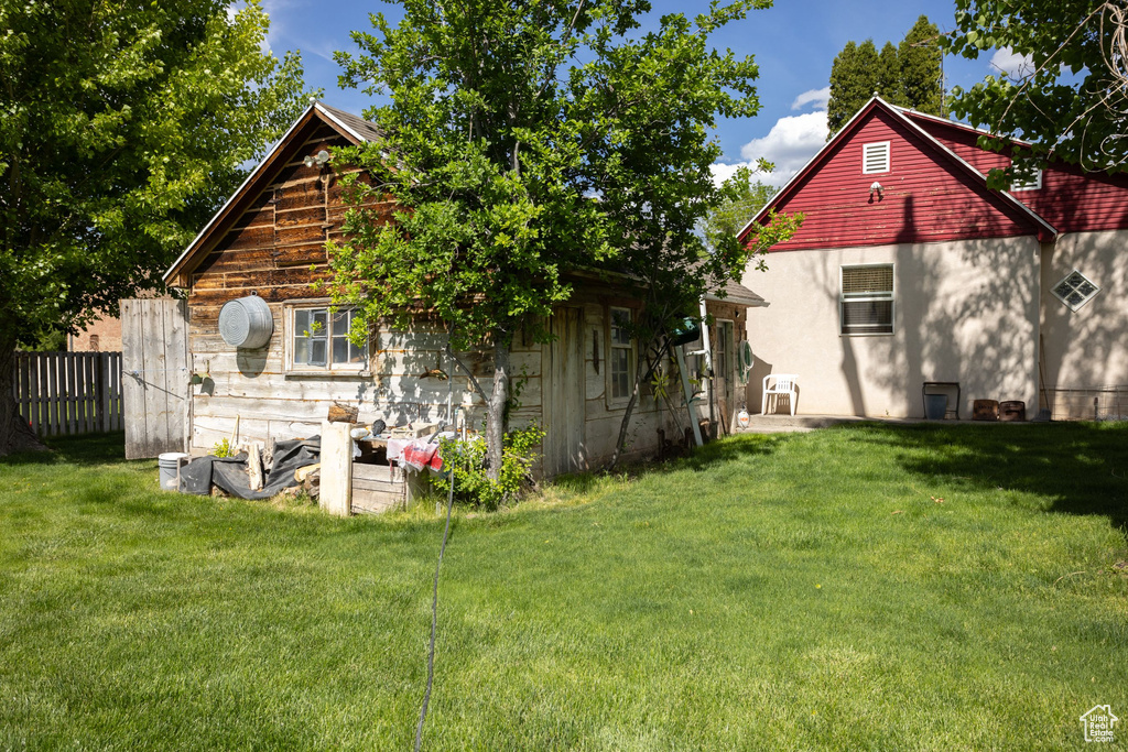 Rear view of house with stucco siding