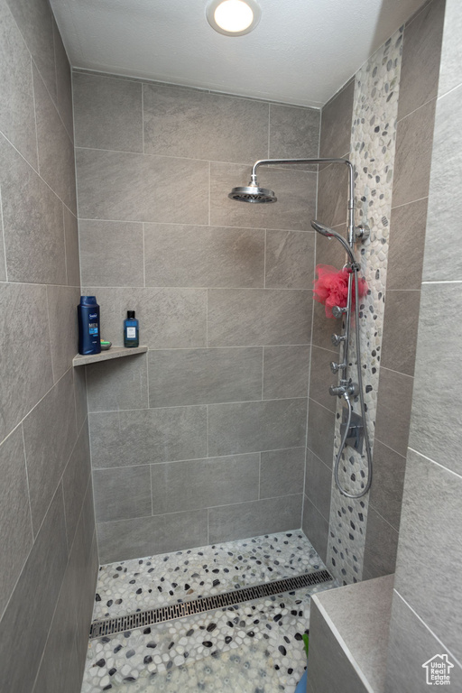 Bathroom with a tile shower