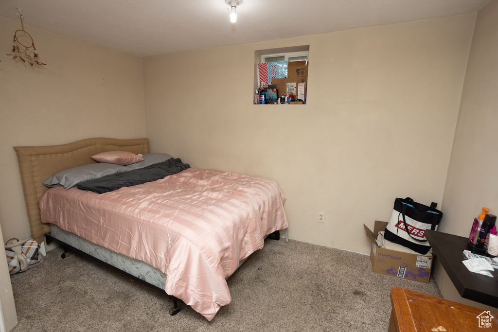 Bedroom featuring carpet