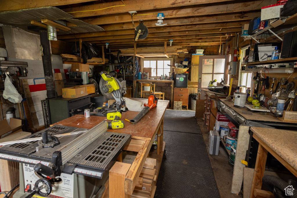 Below grade area featuring a workshop area