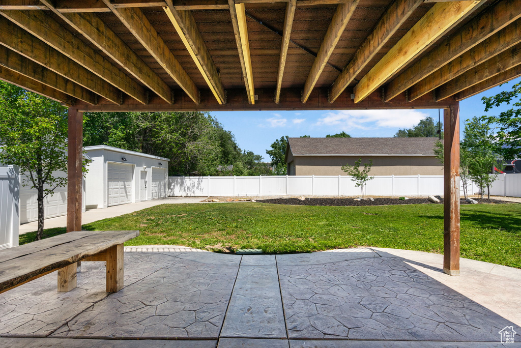 View of patio featuring an outdoor structure