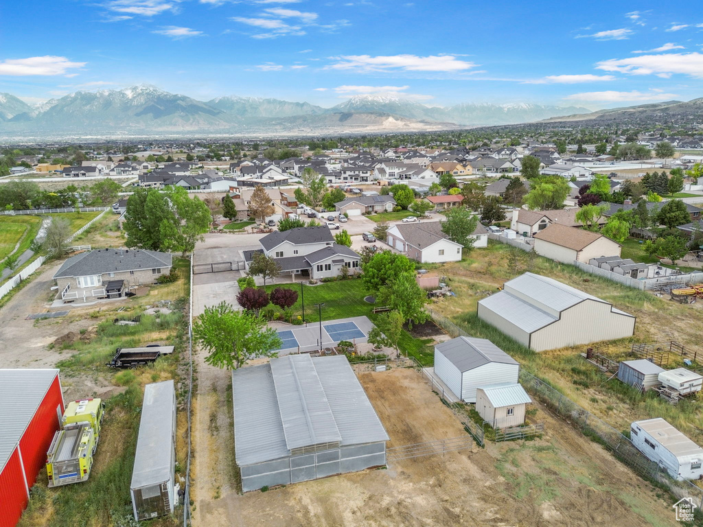 Aerial view of residential area with mountains