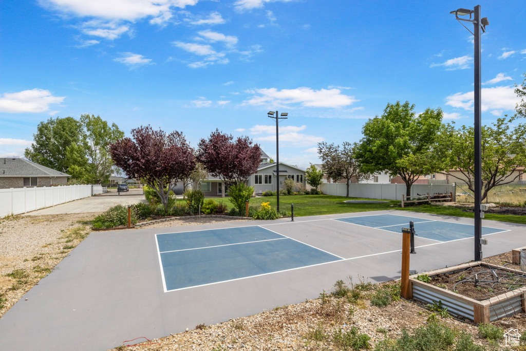 View of basketball court with a tennis court