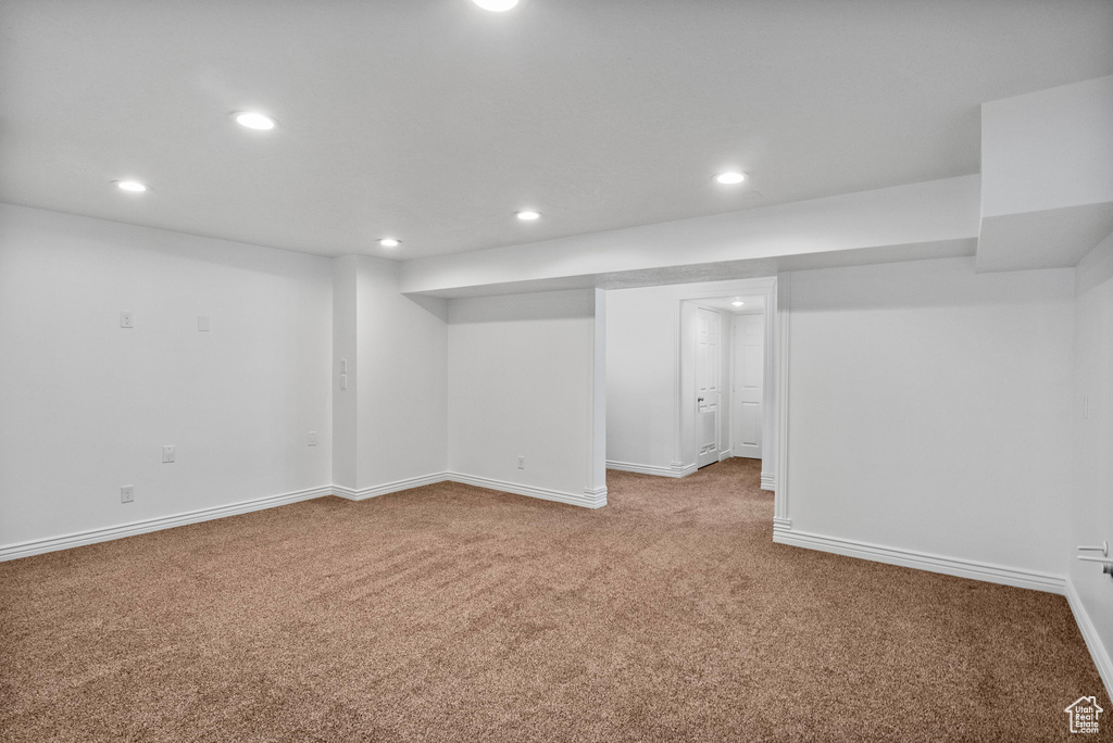 Finished basement with carpet floors, recessed lighting, and baseboards