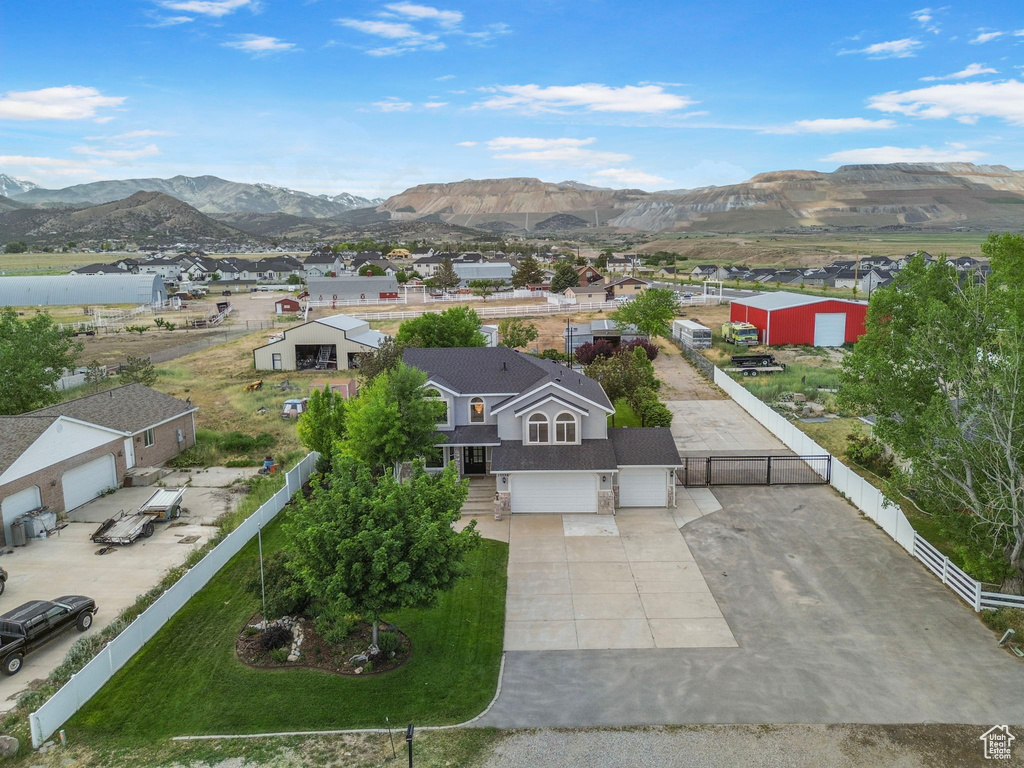 View of subject property with a mountain backdrop