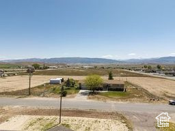 View of road featuring a mountain view and a rural view
