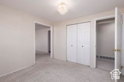 Unfurnished bedroom featuring carpet