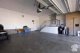 Garage featuring a garage door opener