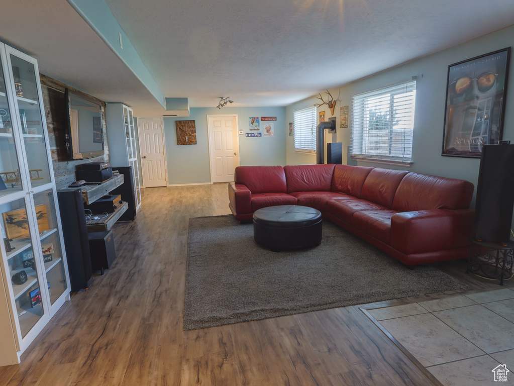 Living room with wood finished floors and baseboards