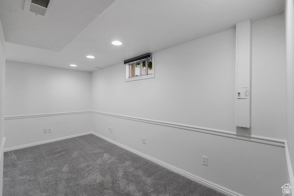 Below grade area featuring recessed lighting, carpet floors, and baseboards