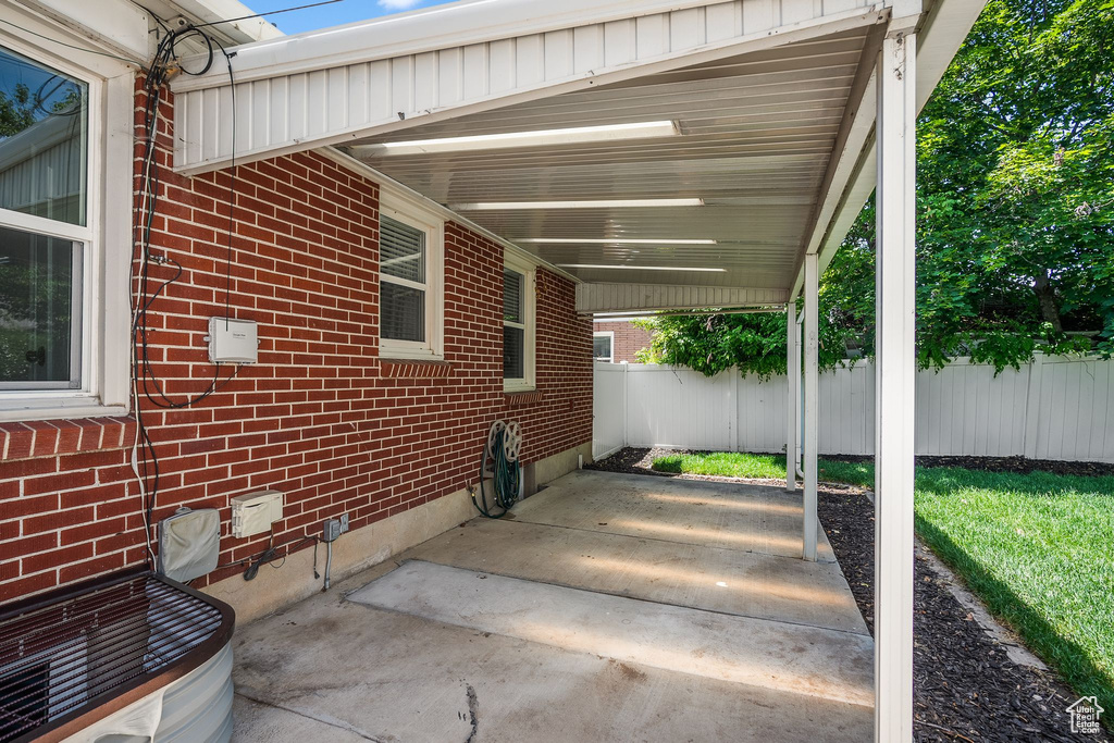 View of patio with an attached carport